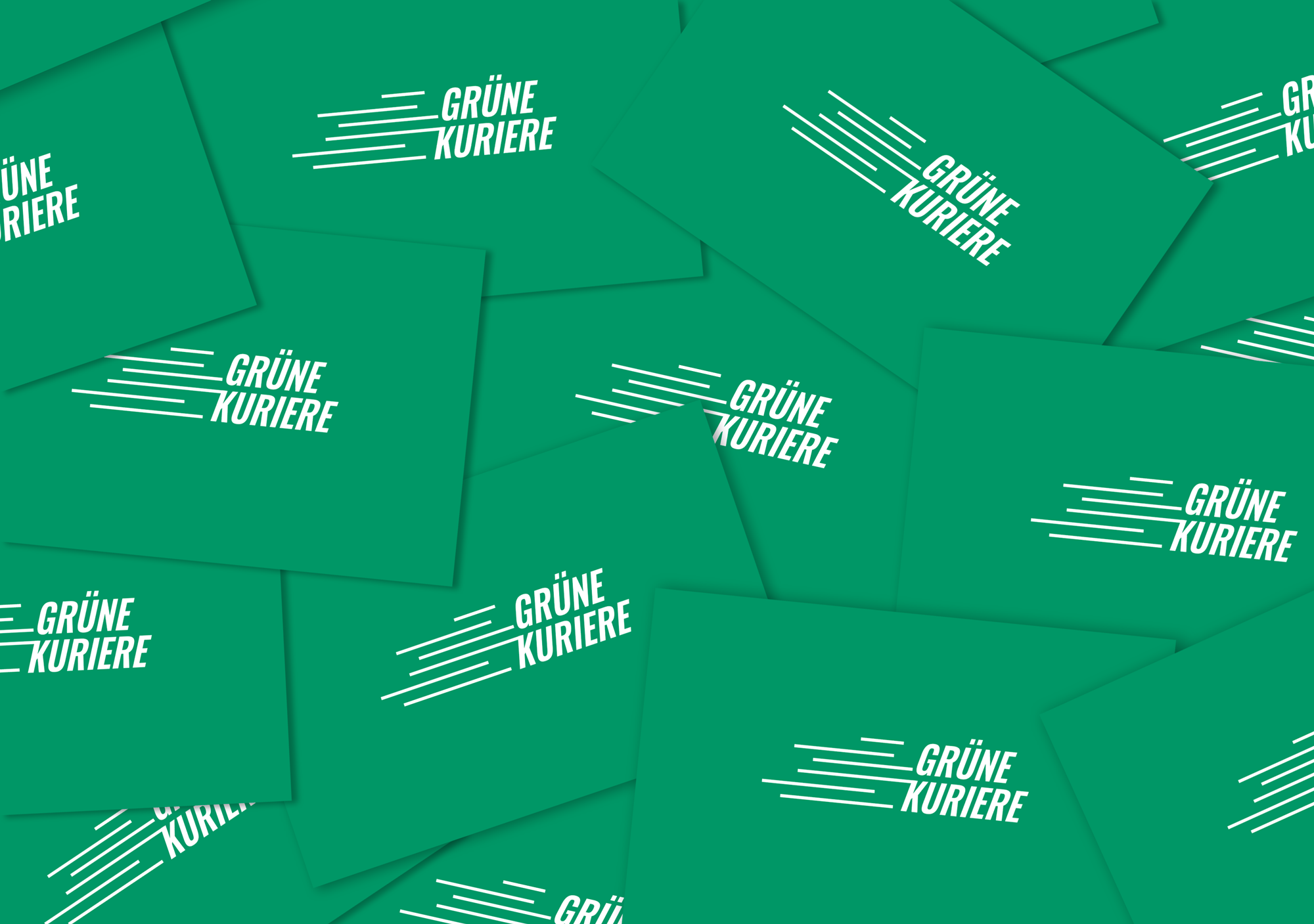 Grüne Visitenkarten mit dem Logo der Grünen Kuriere