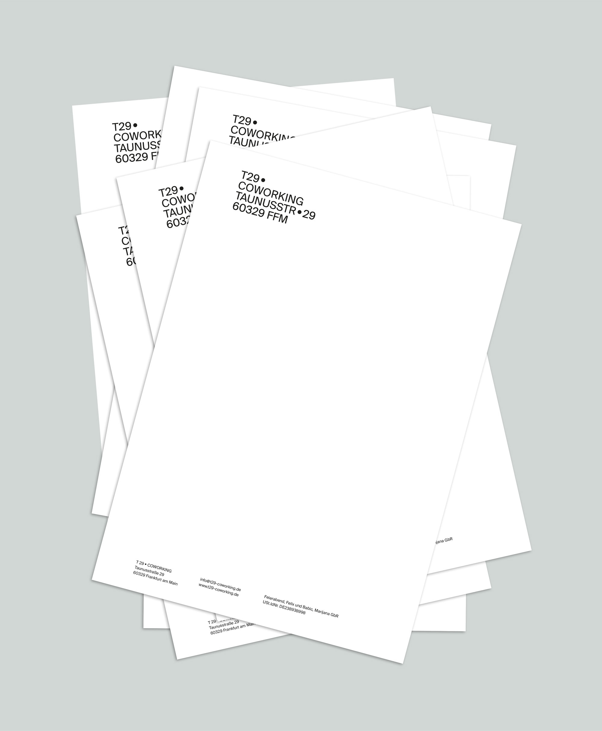 mehrere Blätter des T29 Briefpapiers mit dem T29 Logo links oben